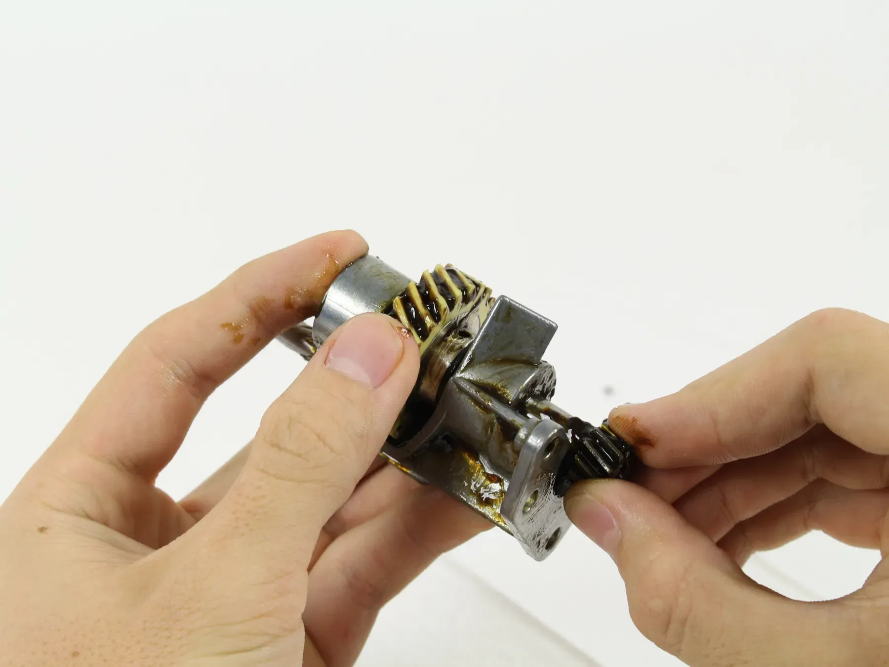 A worn worm gear removed from a KitchenAid stand mixer during replacement